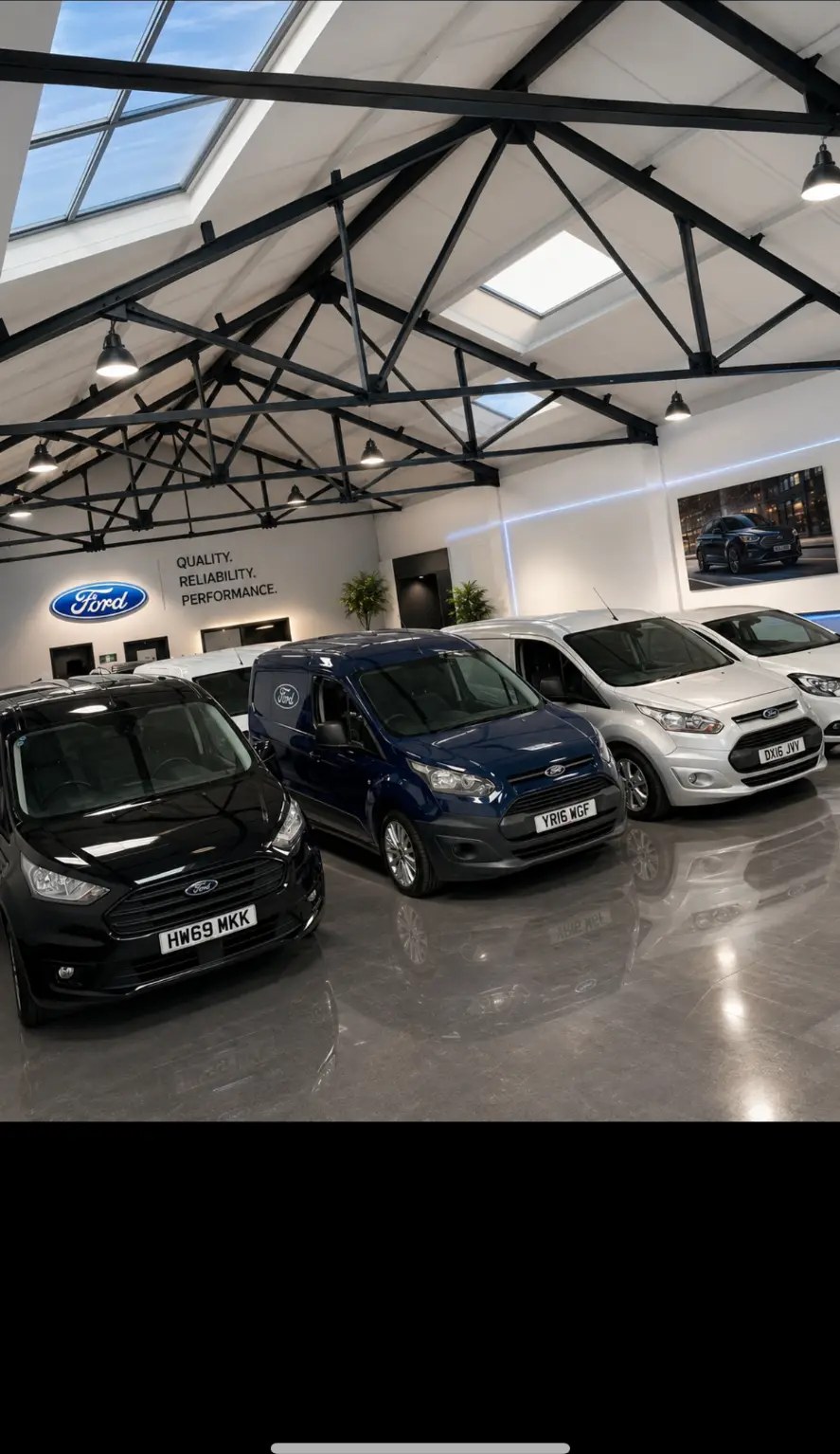 North West Automotive showroom with quality used vans lined up